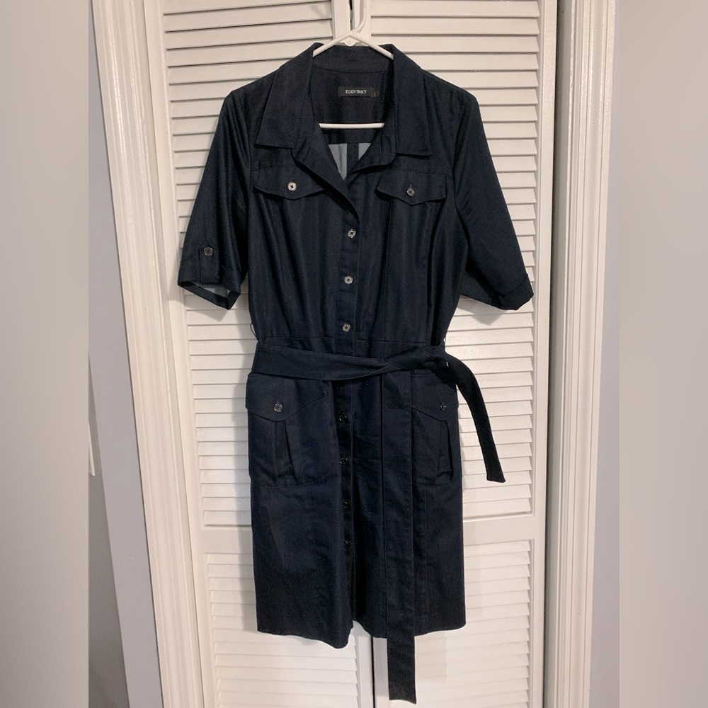 Dark blue dress with belt.